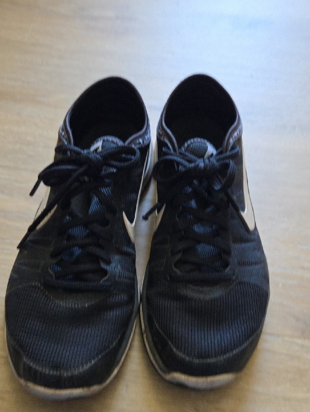 Nike Women’s Black Athletic Sneakers with White Swoosh